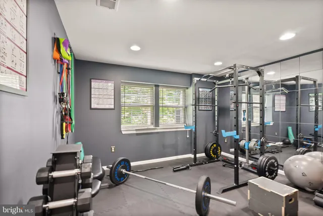 an aerial view of a house with yard