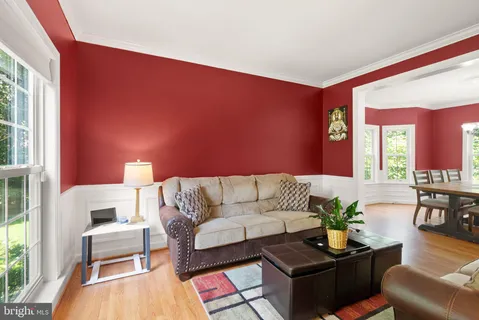 a dining room with furniture window wooden floor