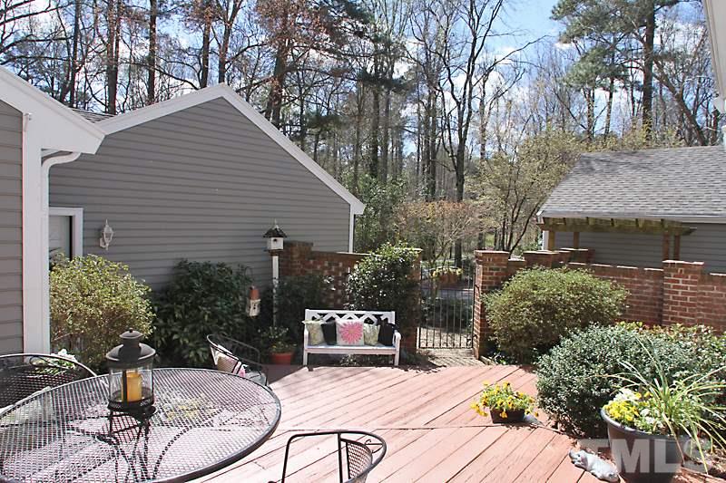 2007 Landings Way Raleigh, NC 27615 - Photo 2 of 17 a view of backyard with outdoor seating and plants