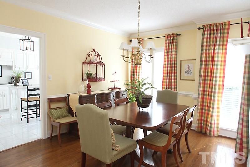 2007 Landings Way Raleigh, NC 27615 - Photo 4 of 17 a view of a dining room with furniture window and wooden floor
