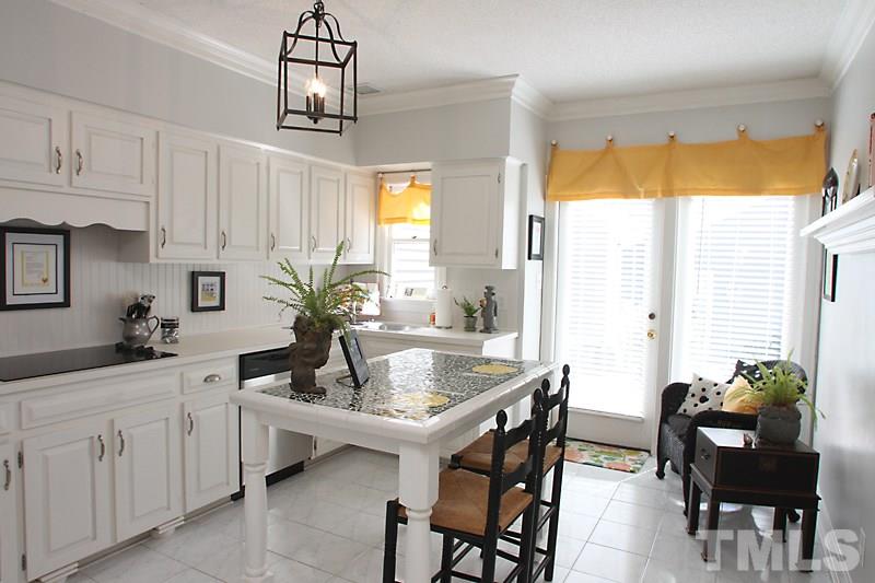 2007 Landings Way Raleigh, NC 27615 - Photo 5 of 17 a dining room with furniture and chandelier
