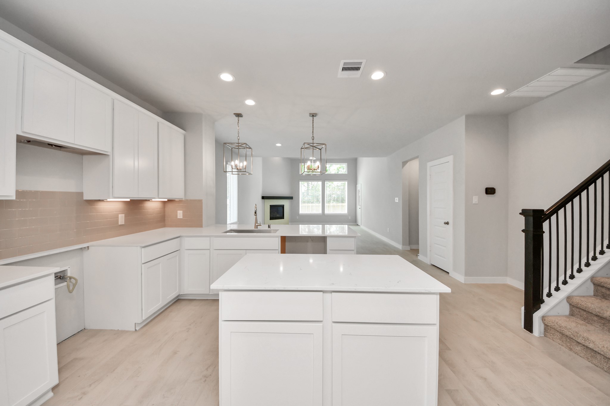 2946 Burris Park Drive Spring, TX 77373 - Photo 14 of 45 The open concept effortlessly connects the kitchen to the expansive family room, forming a perfect hub for gatherings. This seamless flow creates an inviting space where cooking and socializing come together harmoniously.