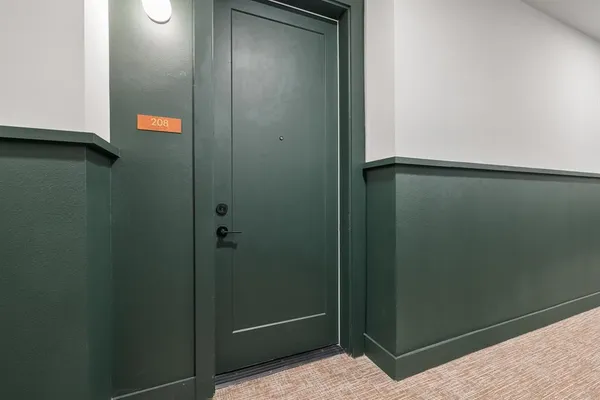 a bathroom with a shower and vanity