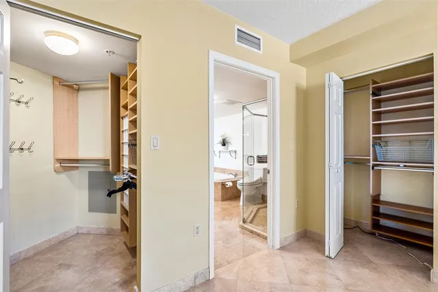 a view of balcony with a potted plants