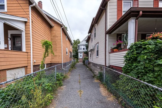 a backyard of a house with lots of green space