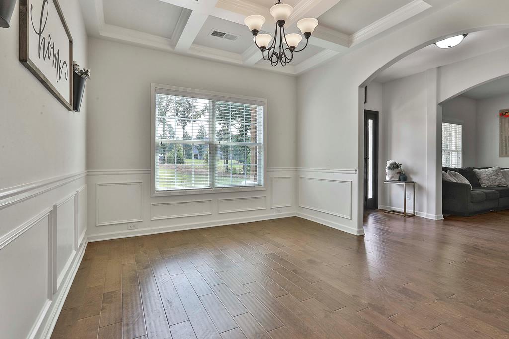 169 Hart Ridge Court Fortson, GA 31808 - Photo 11 of 50 wooden floor in an empty room with a window