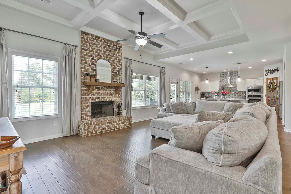 169 Hart Ridge Court Fortson, GA 31808 - Photo 14 of 50 a living room with furniture large window and wooden floor