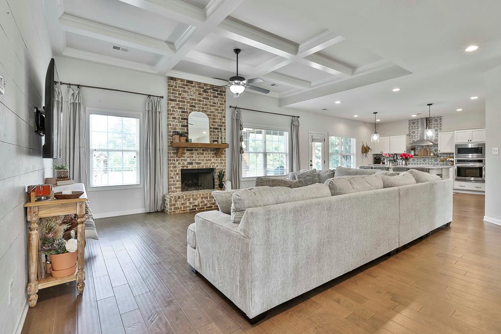 169 Hart Ridge Court Fortson, GA 31808 - Photo 15 of 50 a living room with furniture and a fireplace