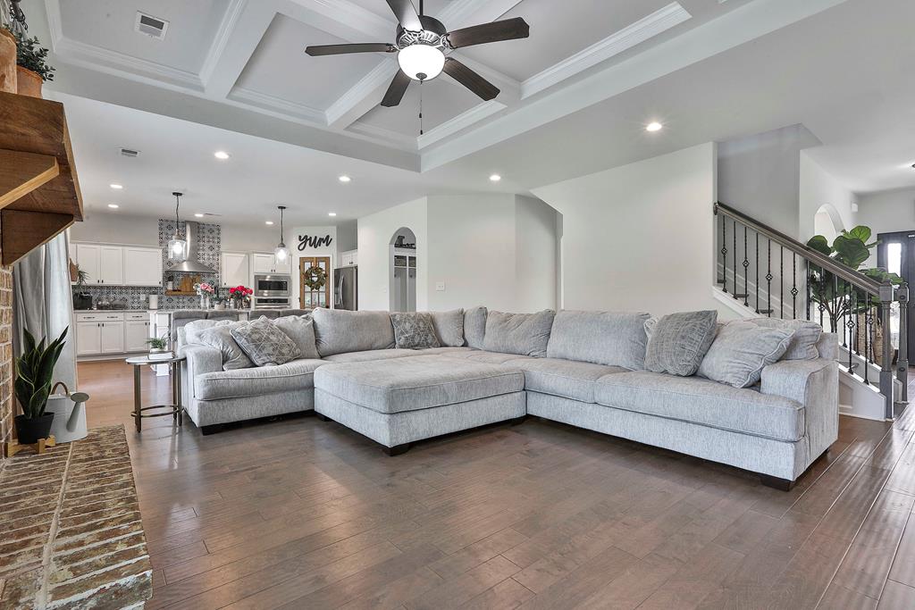 169 Hart Ridge Court Fortson, GA 31808 - Photo 19 of 50 a living room with furniture and a chandelier