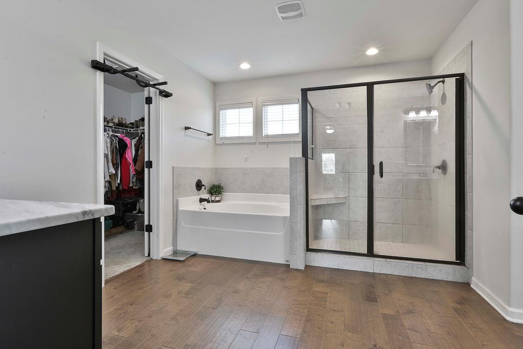 169 Hart Ridge Court Fortson, GA 31808 - Photo 32 of 50 a bathroom with a bathtub and a shower