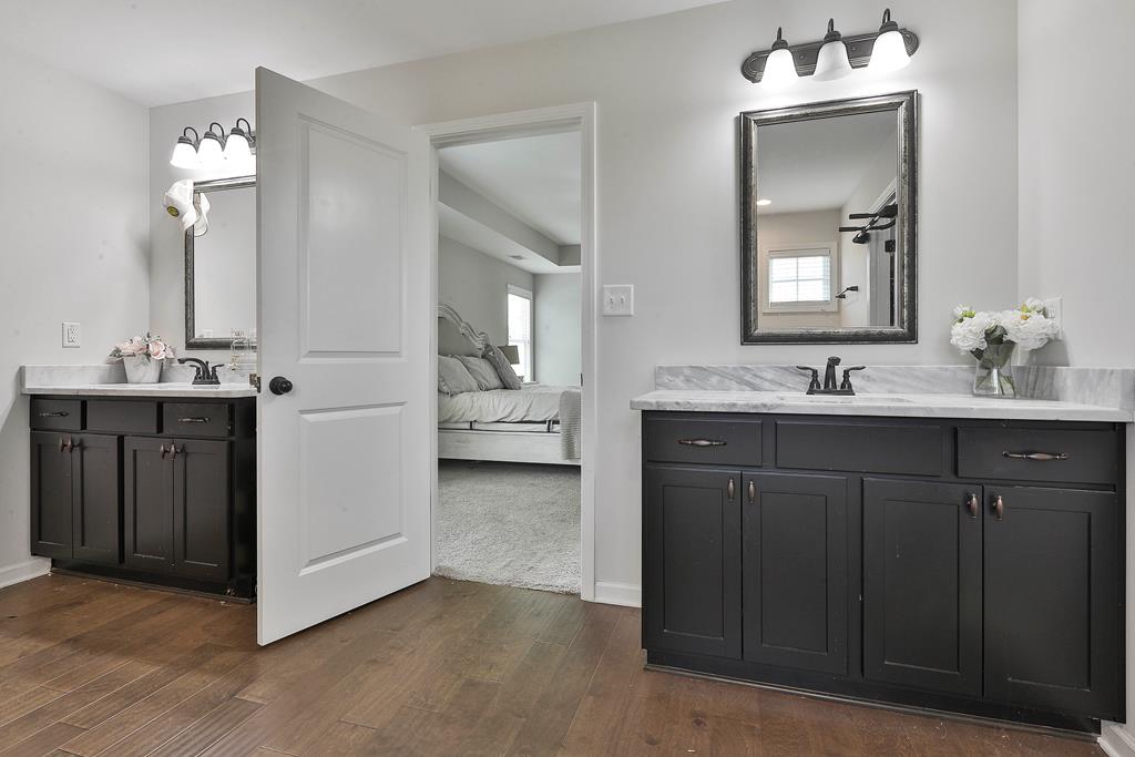169 Hart Ridge Court Fortson, GA 31808 - Photo 33 of 50 a en suite bathroom with a sink double vanity and a mirror