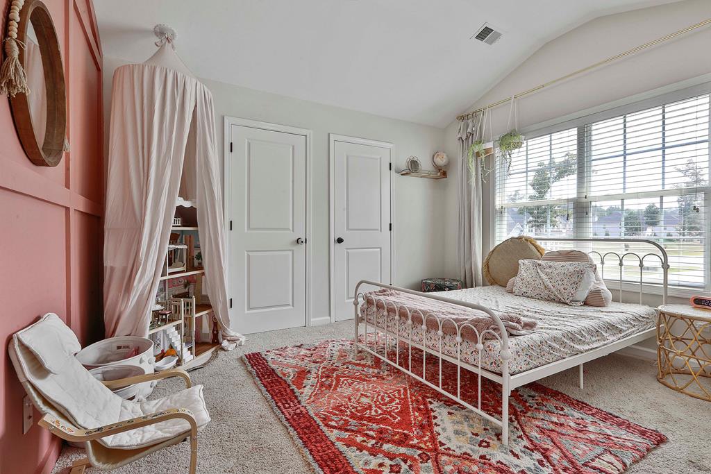 169 Hart Ridge Court Fortson, GA 31808 - Photo 39 of 50 a living room with a bed furniture and a window