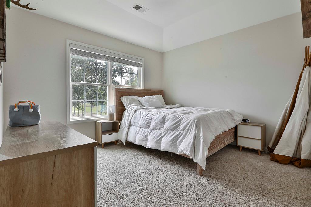 169 Hart Ridge Court Fortson, GA 31808 - Photo 41 of 50 a bedroom with a bed and a window