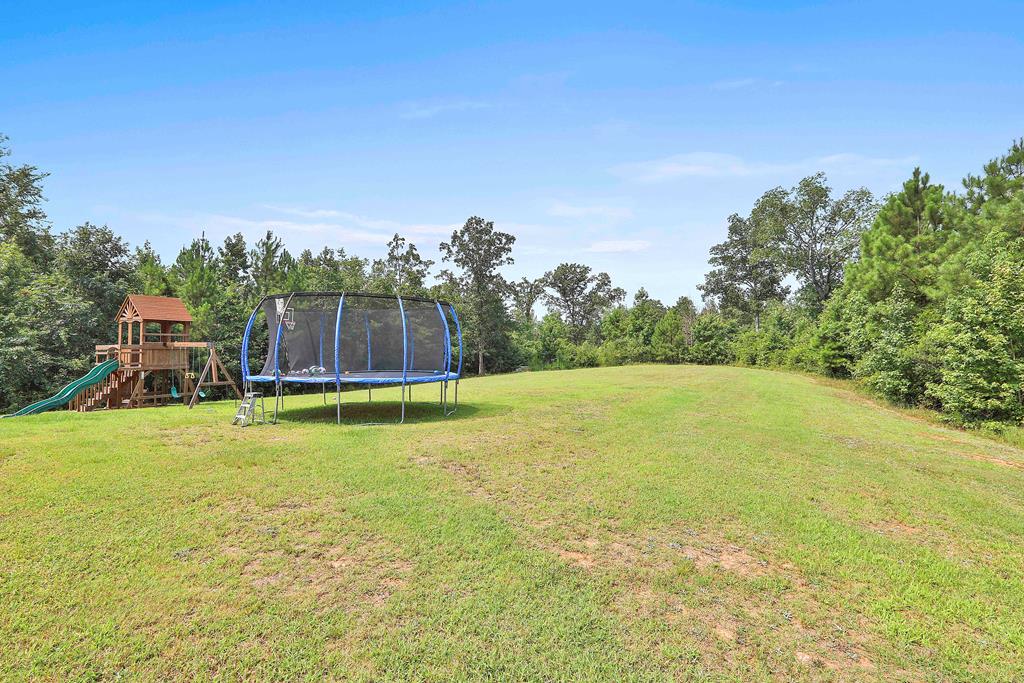 169 Hart Ridge Court Fortson, GA 31808 - Photo 47 of 50 a swimming pool with wooden fence