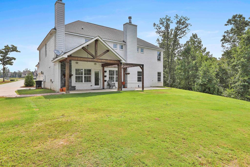 169 Hart Ridge Court Fortson, GA 31808 - Photo 48 of 50 a front view of a house with a yard