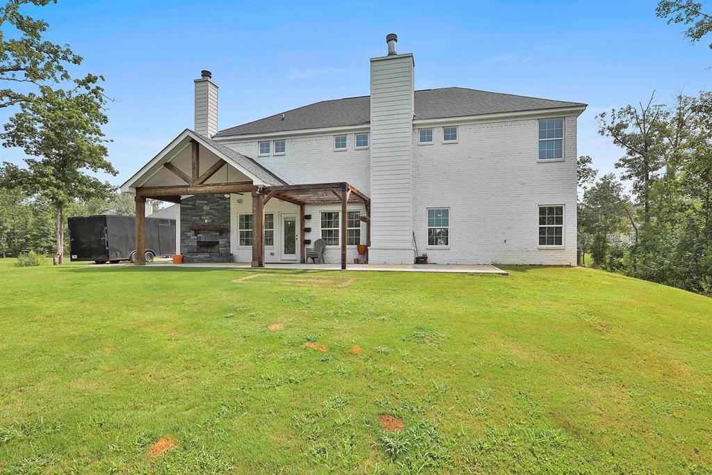 169 Hart Ridge Court Fortson, GA 31808 - Photo 49 of 50 a front view of house with yard and green space