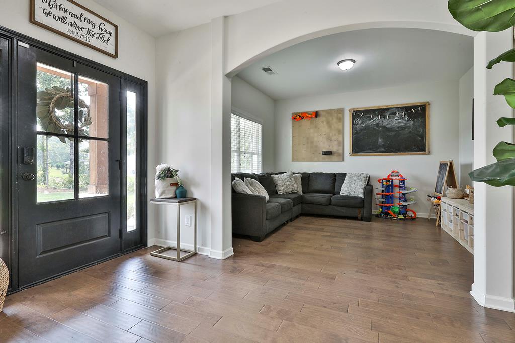 169 Hart Ridge Court Fortson, GA 31808 - Photo 7 of 50 a living room with furniture and a flat screen tv