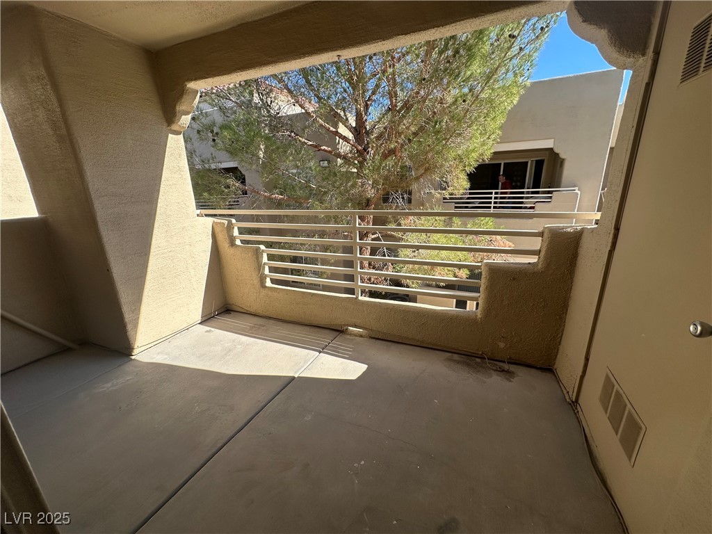 1908 High Valley Court, Unit 204 Las Vegas, NV 89128 - Photo 16 of 18 View of balcony