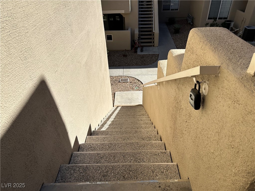 1908 High Valley Court, Unit 204 Las Vegas, NV 89128 - Photo 2 of 18 View of stairs