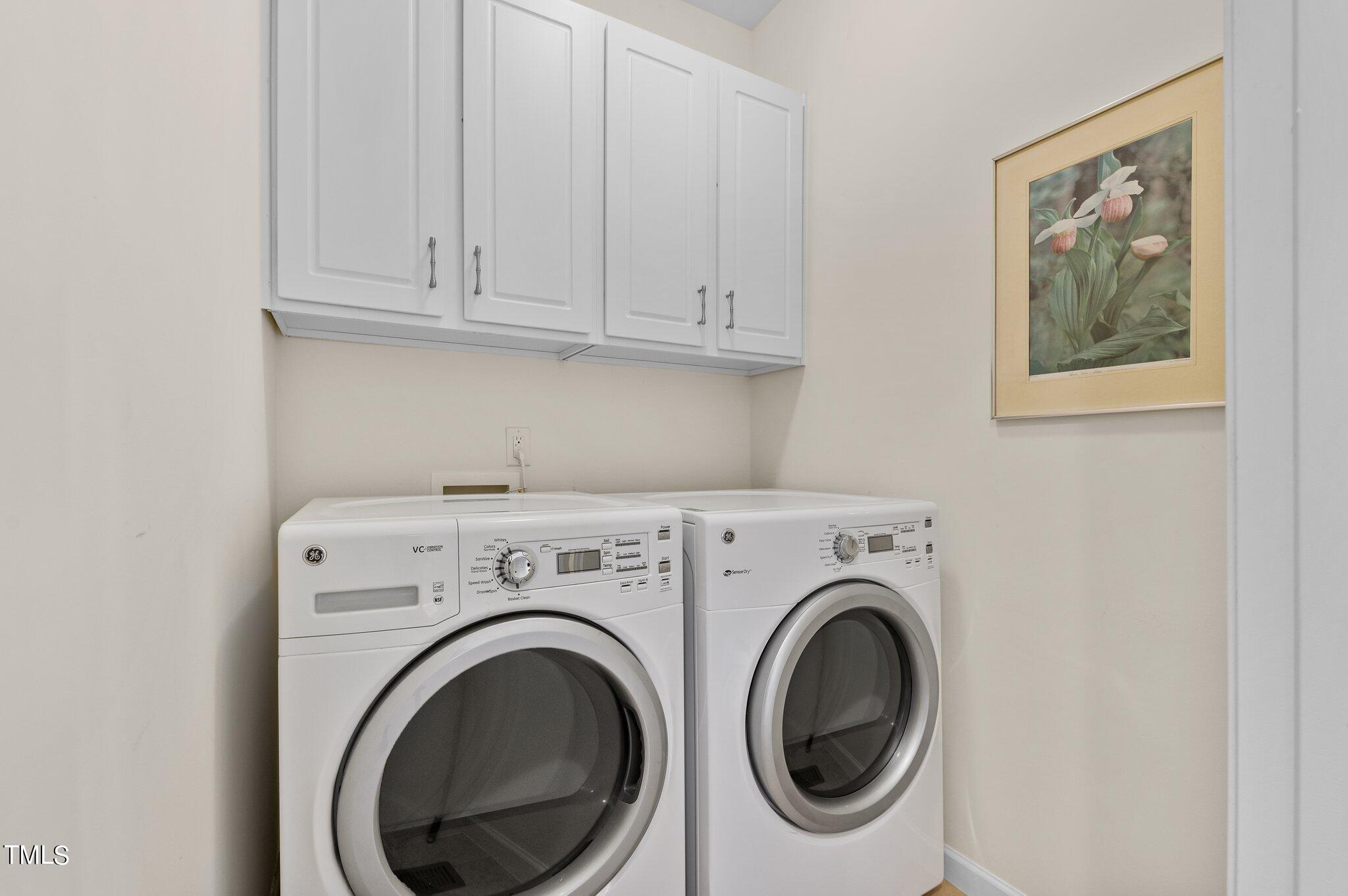 5657 Wade Park Boulevard Raleigh, NC 27607 - Photo 16 of 24 Laundry Room with cabinet space.