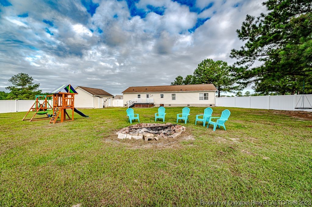 125 Wright Road Vass, NC 28394 - Photo 42 of 48 an outdoor space with furniture and garden