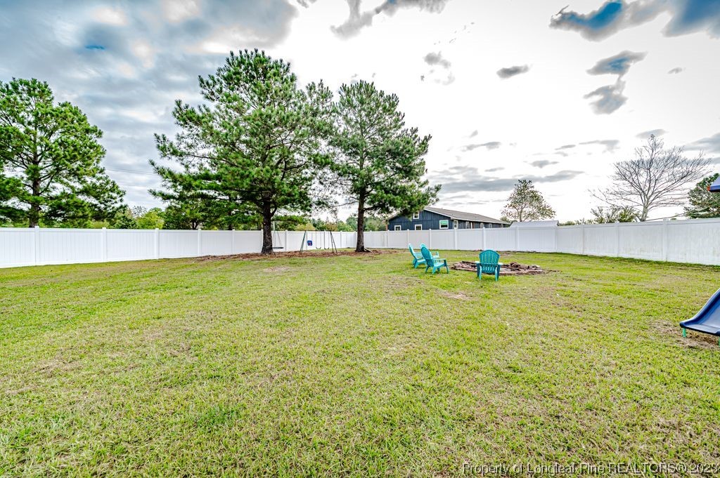 125 Wright Road Vass, NC 28394 - Photo 44 of 48 a view of an outdoor space and swimming pool