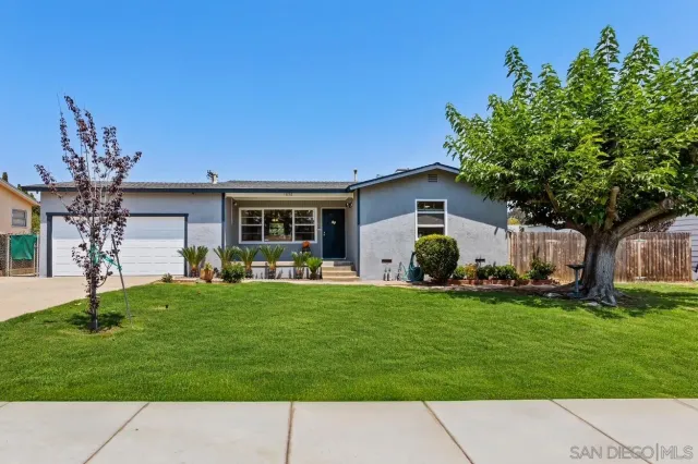 a house view with a garden space