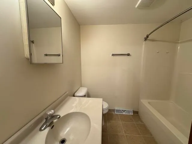 a bathroom with a sink and a tub