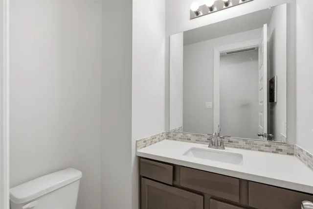 a bathroom with a sink and a toilet