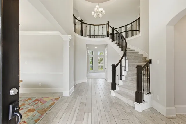 a view of entryway with wooden floor
