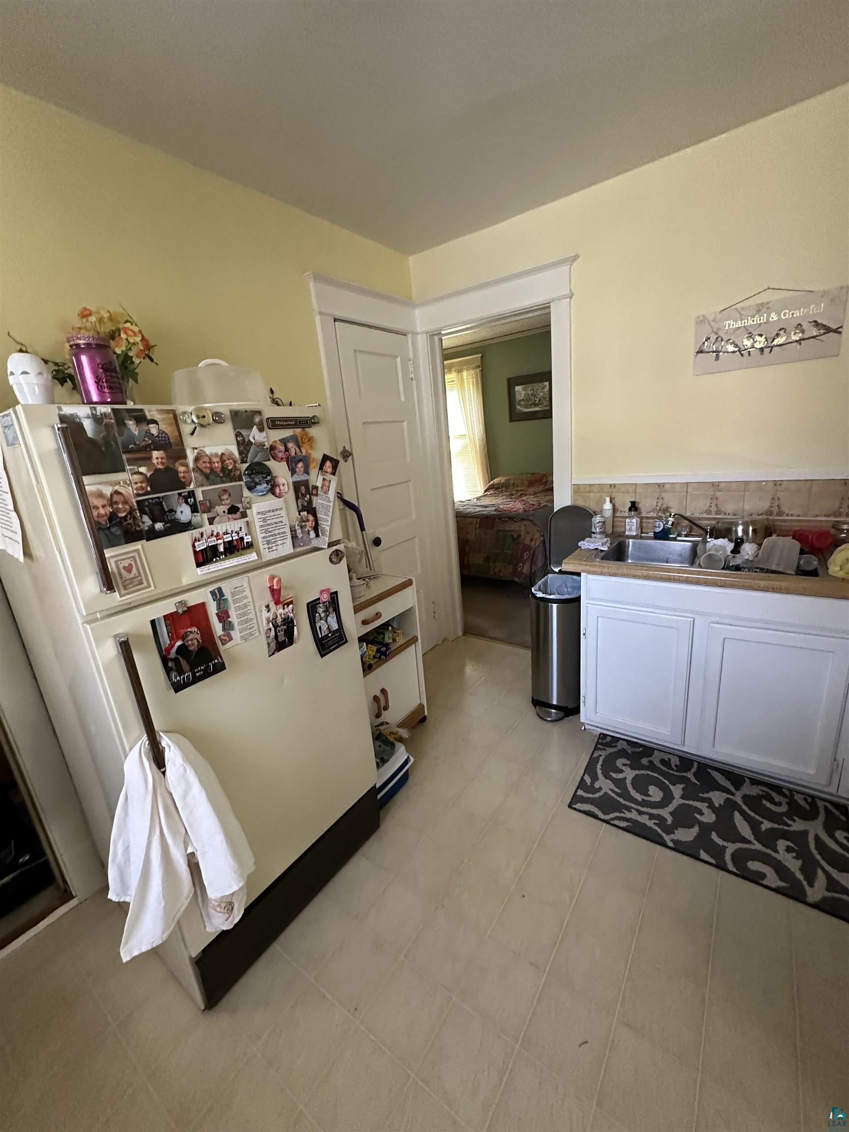 2119 West 3rd Street Duluth, MN 55806 - Photo 23 of 32 Interior space with white refrigerator