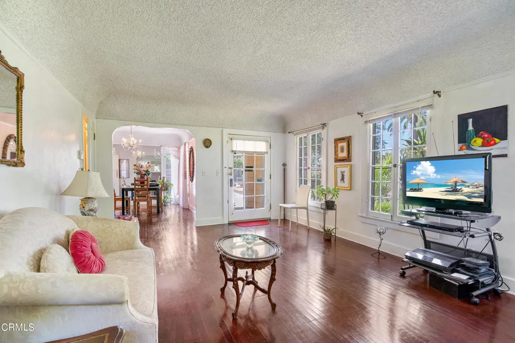 2122 Navarro Avenue Altadena, CA 91001 - Photo 16 of 40 a living room with furniture and a flat screen tv