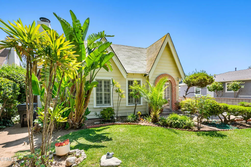 2122 Navarro Avenue Altadena, CA 91001 - Photo 2 of 40 a view of a house with swimming pool and garden