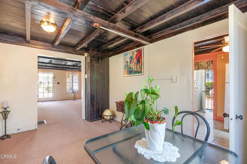 2122 Navarro Avenue Altadena, CA 91001 - Photo 28 of 40 a dining room with furniture and a potted plant
