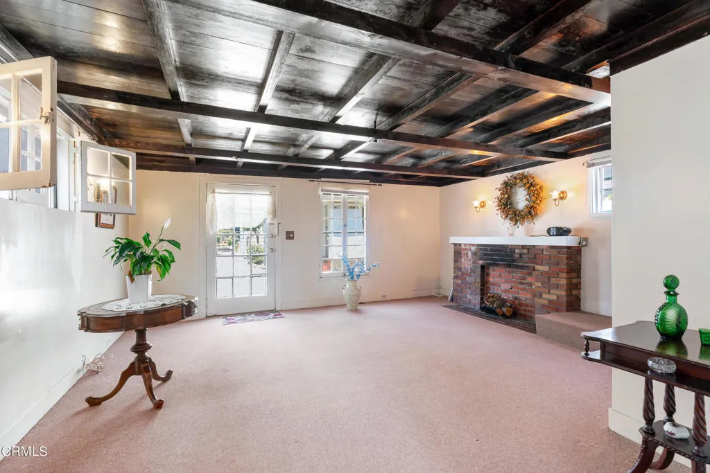 2122 Navarro Avenue Altadena, CA 91001 - Photo 38 of 40 a view of livingroom with furniture and a fireplace