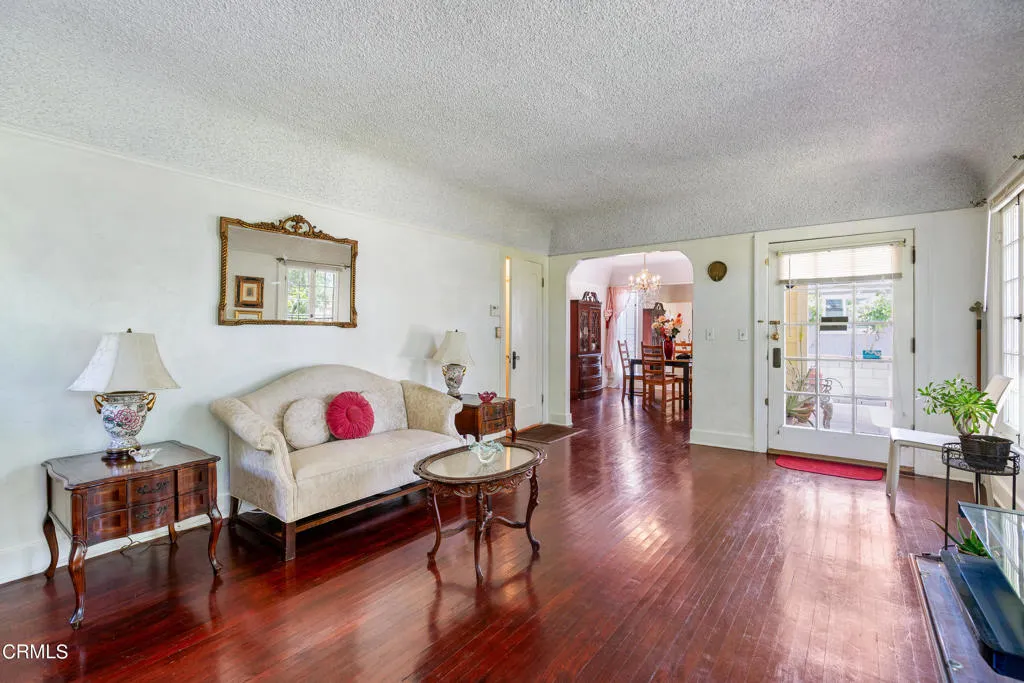 2122 Navarro Avenue Altadena, CA 91001 - Photo 5 of 40 a living room with furniture and wooden floor
