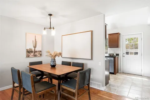 a view of a dining room with furniture
