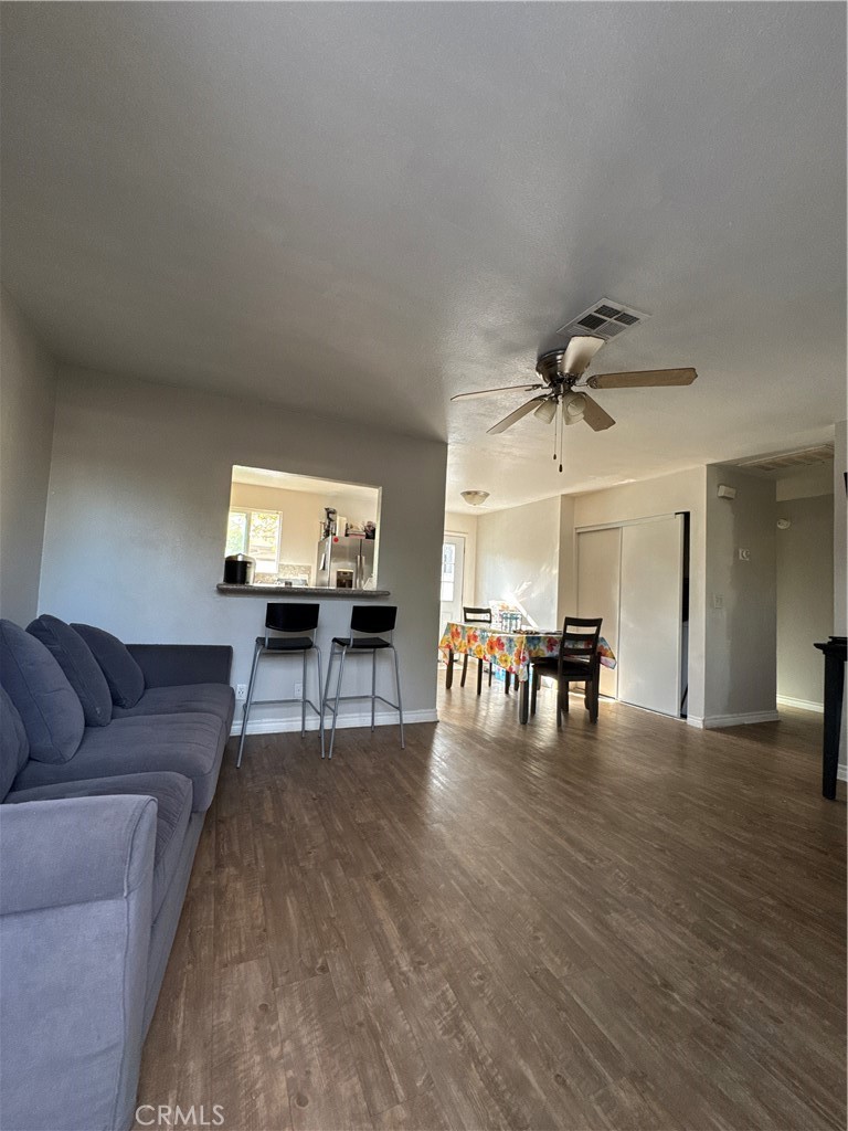 4438 Park Avenue Riverside, CA 92507 - Photo 9 of 23 a living room with furniture and wooden floor