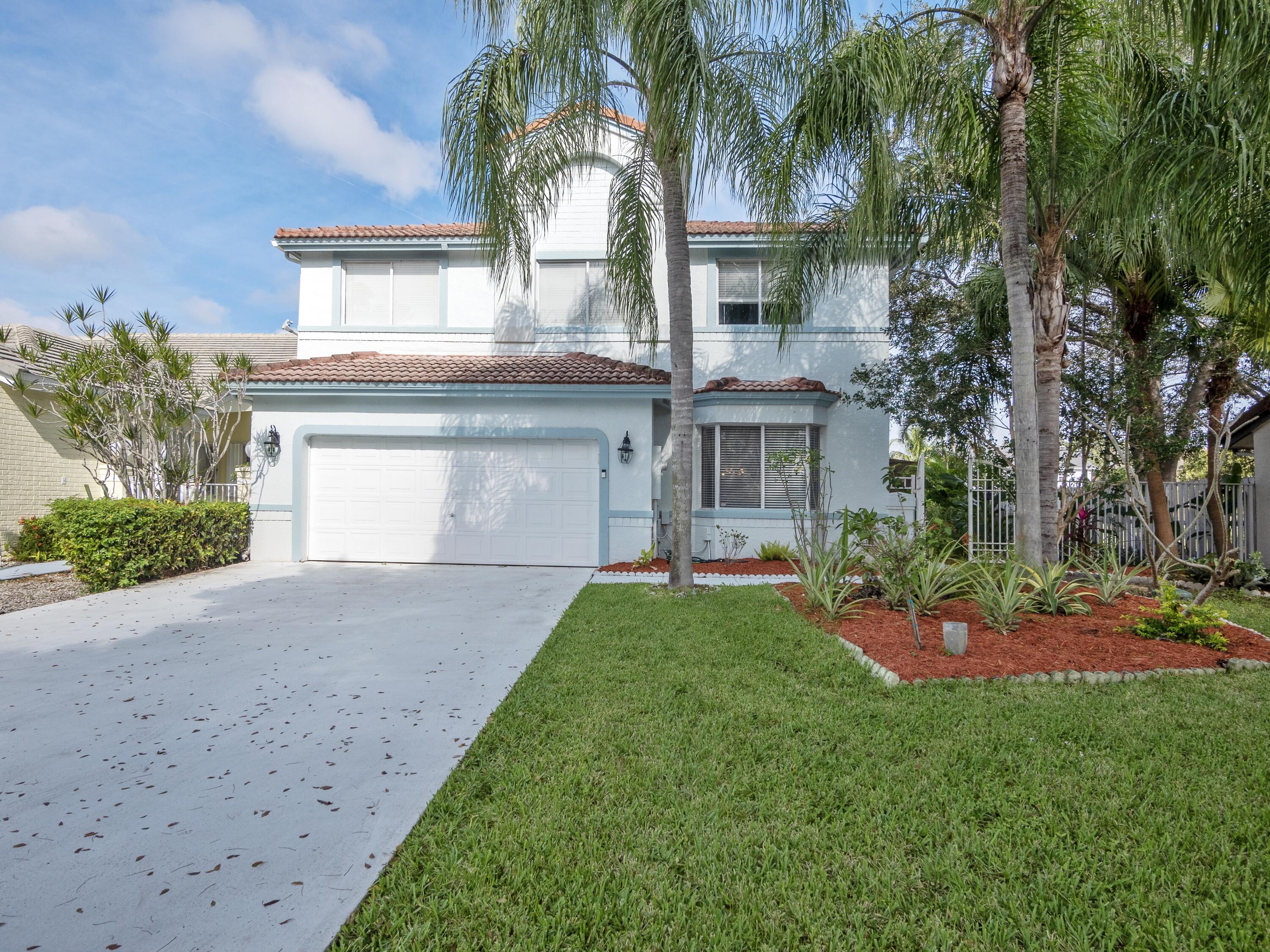 10837 Palm Spring Drive Boca Raton, FL 33428 - Photo 2 of 21 Front