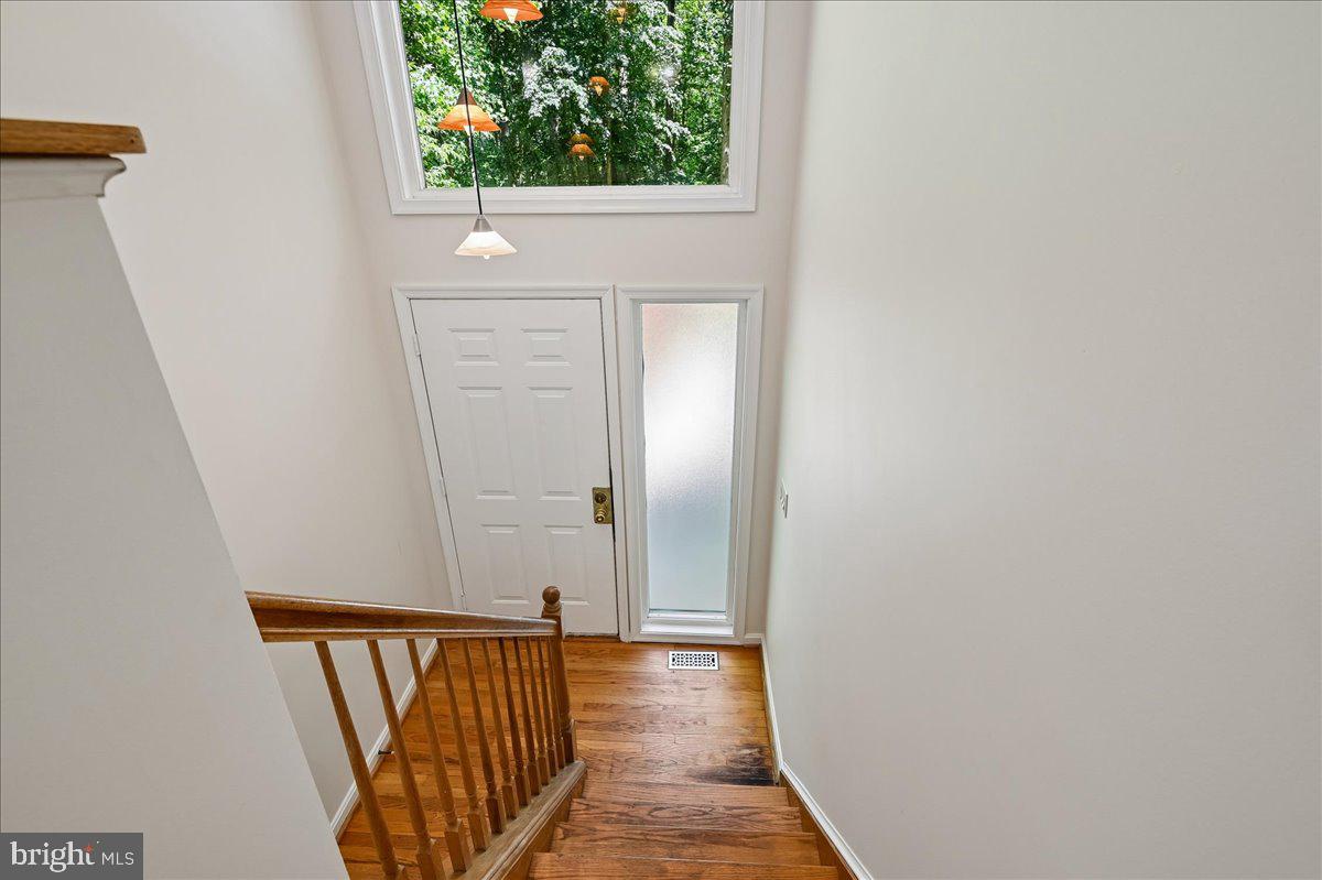3633 Patuxent River Road Davidsonville, MD 21035 - Photo 47 of 85 2nd Entrance w/Large Transom Windows & Wood Stairs