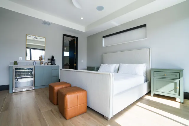 a bathroom with a sink vanity and a mirror