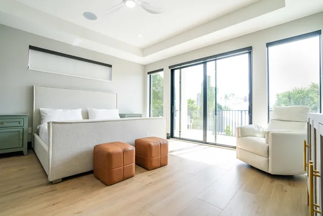 a bathroom with a shower a toilet and a sink