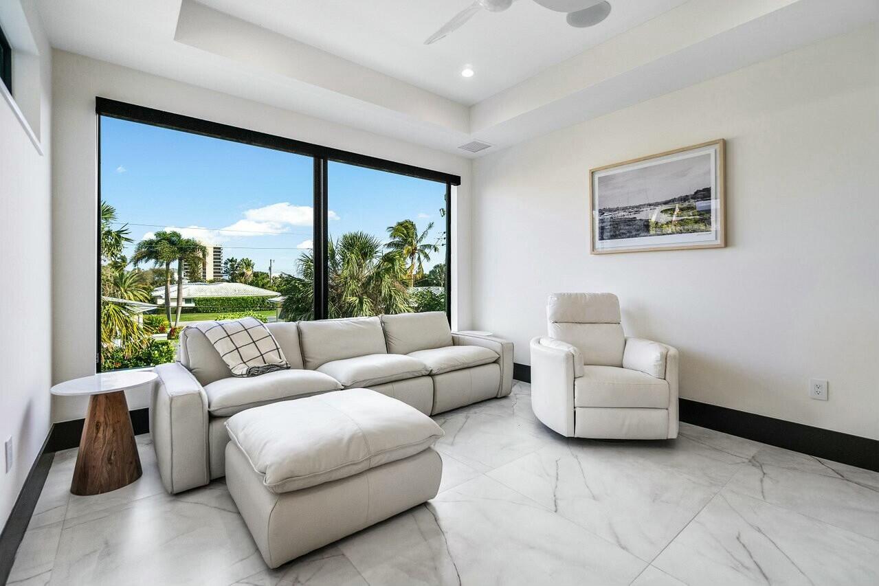13480 Highway 1 Juno Beach, FL 33408 - Photo 35 of 90 a living room with furniture and a large window
