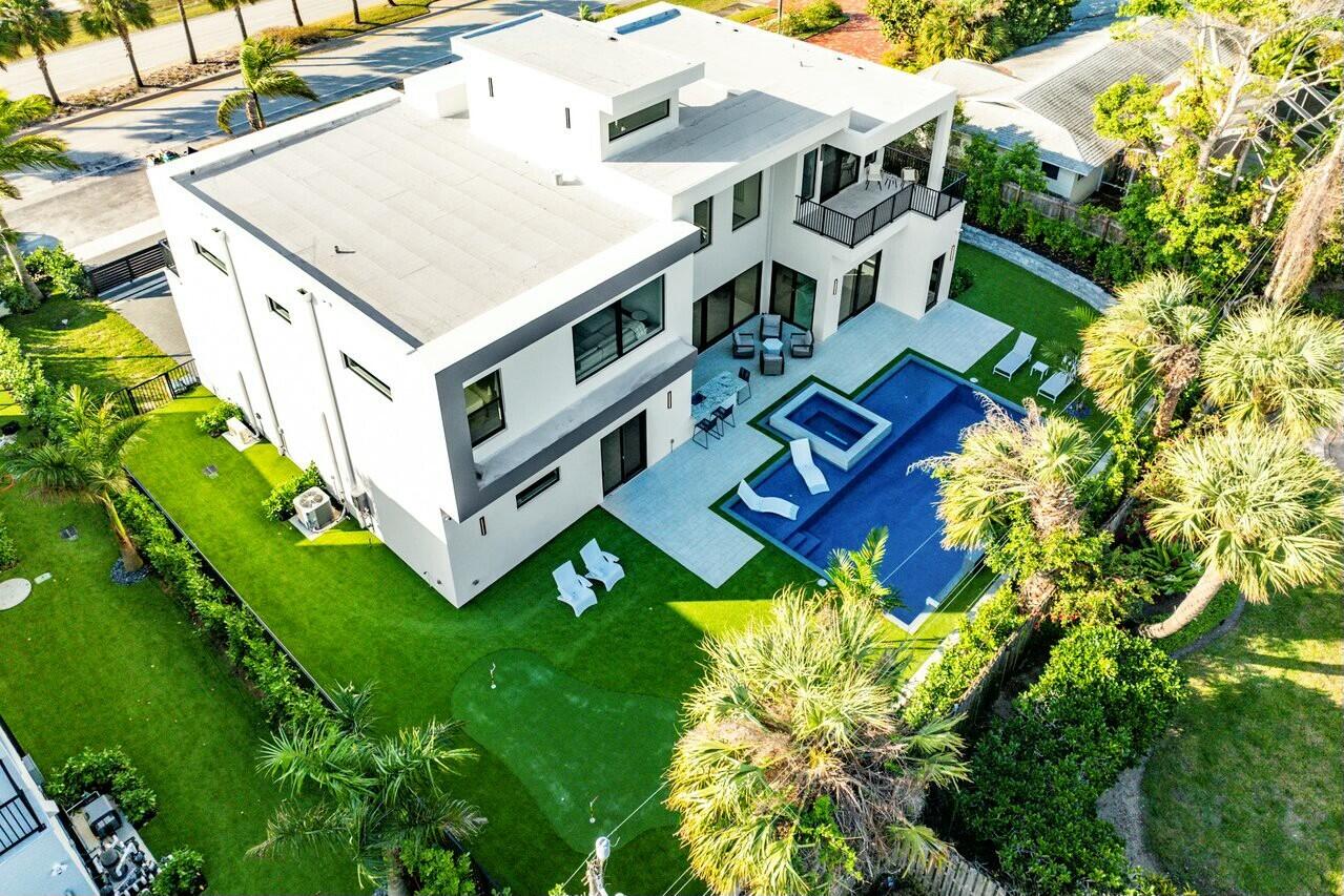 13480 Highway 1 Juno Beach, FL 33408 - Photo 70 of 90 an aerial view of residential house with an outdoor space