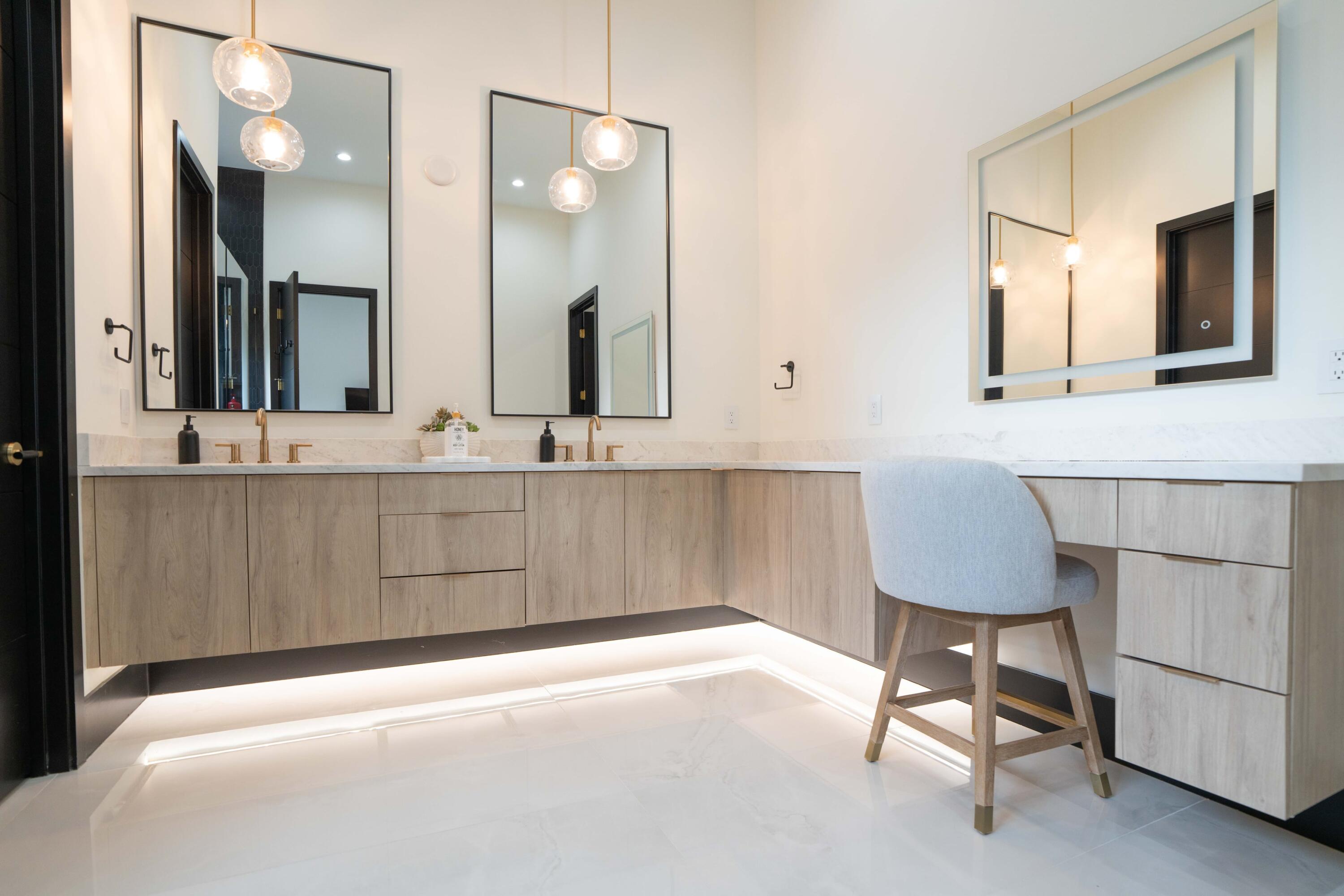 13480 Highway 1 Juno Beach, FL 33408 - Photo 79 of 90 a bathroom with a sink vanity and a mirror