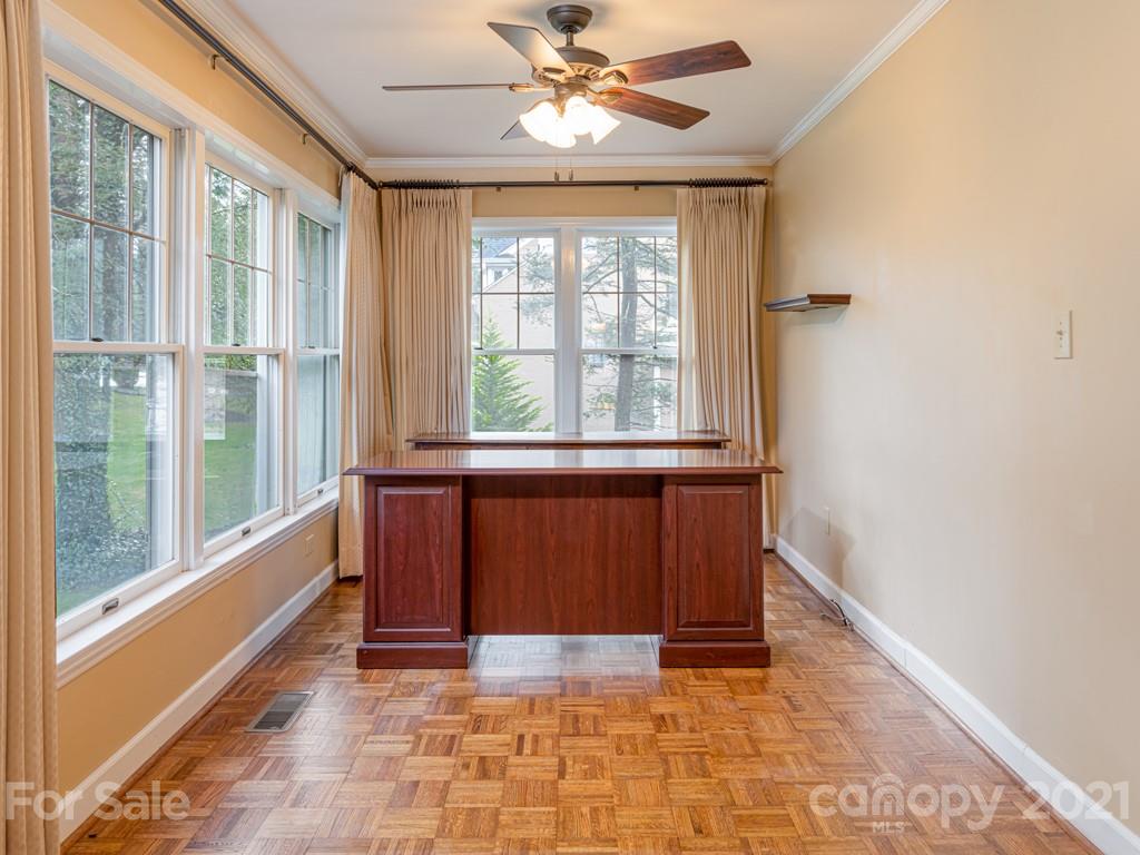 11 Hilltop Road Asheville, NC 28803 - Photo 12 of 42 a view of an empty room with a window
