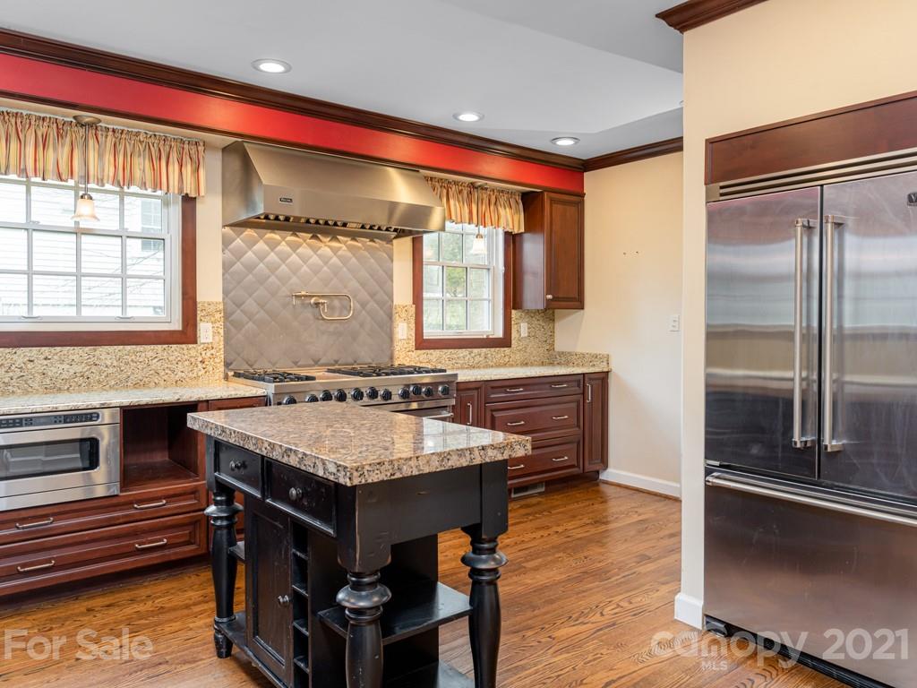 11 Hilltop Road Asheville, NC 28803 - Photo 16 of 42 a bathroom with a tub and a sink