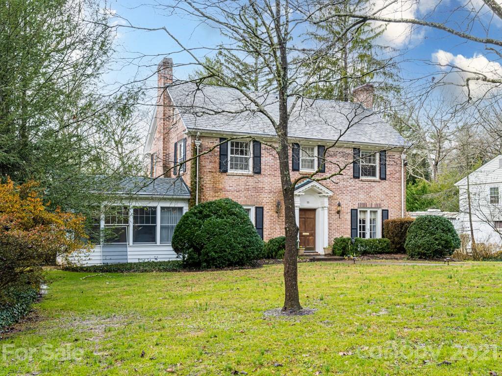11 Hilltop Road Asheville, NC 28803 - Photo 3 of 42 a front view of house with yard and green space