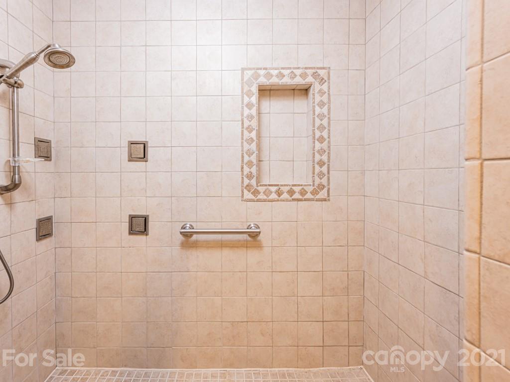 11 Hilltop Road Asheville, NC 28803 - Photo 24 of 42 a bathroom with a shower
