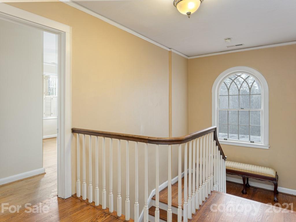 11 Hilltop Road Asheville, NC 28803 - Photo 26 of 42 a view of entryway with a front door and wooden floor